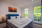 Schlafzimmer - Strandhaus Apartment 01 - Top-Hundeurlaub