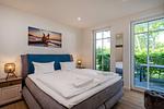Schlafzimmer - Strandhaus Apartment 04 - Top-Hundeurlaub