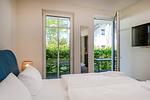 Schlafzimmer - Strandhaus Apartment 04 - Top-Hundeurlaub
