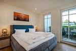 Schlafzimmer - Strandhaus Apartment 05 - Top-Hundeurlaub
