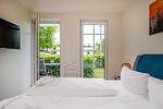 Schlafzimmer - Strandhaus Apartment 06 - Top-Hundeurlaub