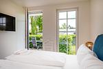 Gartenblick - Strandhaus Apartment 06 - Top-Hundeurlaub