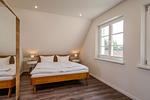 Schlafzimmer - Haus Westwind 1 - Top-Hundeurlaub