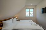 Schlafzimmer - Haus Westwind 1 - Top-Hundeurlaub