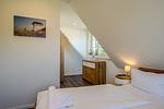 Schlafzimmer - Haus Westwind 1 - Top-Hundeurlaub