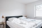 Schlafzimmer - Dünenquartier Apartment 01 - Top-Hundeurlaub