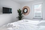 Schlafzimmer - Dünenquartier Apartment 01 - Top-Hundeurlaub