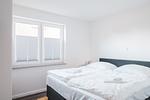 Schlafzimmer - Dünenquartier Apartment 02 - Top-Hundeurlaub