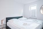 Schlafzimmer - Dünenquartier Apartment 02 - Top-Hundeurlaub