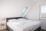 Schlafzimmer - Dünenquartier Apartment 03 - Top-Hundeurlaub