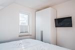 Schlafzimmer - Dünenquartier Apartment 03 - Top-Hundeurlaub