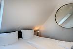 Schlafzimmer - Dünenquartier Apartment 04 - Top-Hundeurlaub