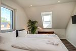 Schlafzimmer - Dünenquartier Apartment 05 - Top-Hundeurlaub