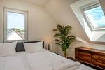 Schlafzimmer - Dünenquartier Apartment 05 - Top-Hundeurlaub
