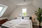 Schlafzimmer - Dünenquartier Apartment 05 - Top-Hundeurlaub