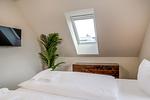 Schlafzimmer - Dünenquartier Apartment 05 - Top-Hundeurlaub