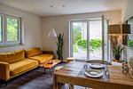 Wohnzimmer - Dünenquartier Apartment 24 - Top-Hundeurlaub