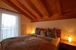 Schlafzimmer - Alpenrose - Feriendorf Via Claudia Haus 53 - Top-Hundeurlaub