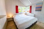 1. Schlafzimmer mit Doppelbett - Ferienhaus 11 - Top-Hundeurlaub