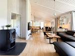 Wohnzimmer mit Kamin - Ferienhaus 13 - Top-Hundeurlaub