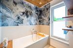 Baden mit Blick in die Natur Rügens - Villa Schlossblick - Appartement Meersand - Top-Hundeurlaub