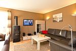 Wohnbereich mit großem Sofa - Ferienhaus Bella Vista - Top-Hundeurlaub
