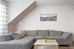 Wohnzimmer mit Sofaecke - Wohnung 07-7 - Top-Hundeurlaub