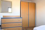 Kleiderschrank im ersten Schlafzimmer - Wohnung 07-7 - Top-Hundeurlaub
