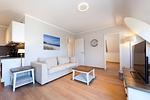 Wohnzimmer mit 3-er Sofa - Wohnung 59 - Top-Hundeurlaub