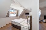 Schlafzimmer mit Fernseher - Wohnung 59 - Top-Hundeurlaub