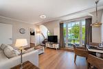 Wohnzimmer mit Blick zur Terrasse - Wohnung 59 - Top-Hundeurlaub