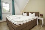 Schlafzimmer - FeWo13-5: strandnah,Balkon,Sauna,Pool - Top-Hundeurlaub