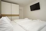 Schlafzimmer - FeWo13-5: strandnah,Balkon,Sauna,Pool - Top-Hundeurlaub