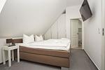 Schlafzimmer - FeWo13-5: strandnah,Balkon,Sauna,Pool - Top-Hundeurlaub
