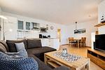 Wohnzimmer mit Blick zum Essbereich - Wohnung 39 - Top-Hundeurlaub