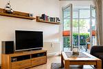 Wohnzimmer mit TV - Wohnung 39 - Top-Hundeurlaub
