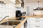 Küche mit Kaffeemaschine und Toaster - Wohnung 39 - Top-Hundeurlaub