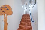 Treppenaufgang zum Obergeschoss - Wohnung 069 - Top-Hundeurlaub