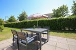 Wohnzimmer mit Blick zur Terrasse - Wohnung 069 - Top-Hundeurlaub