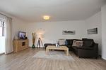 Wohnzimmer mit Sitzecke - Reethaus 19a - Top-Hundeurlaub