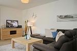 Wohnzimmer mit TV - Reethaus 19a - Top-Hundeurlaub