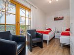 Schlafzimmer mit zwei Einzelbetten - Wohnung 2.1 - Möwennest - Top-Hundeurlaub