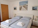 Schlafzimmer mit Doppelbett - Wohnung 2.3 - Waldesruh - Top-Hundeurlaub