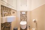 Modernes Badezimmer mit Waschbecken und Toilette - Strandoase - Wohnung 3 - Top-Hundeurlaub