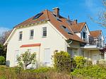 Außenansicht eines Hauses mit rotem Dach - Strandoase - Wohnung 3 - Top-Hundeurlaub