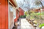 Traditionelles rotes Fischerhaus Fiskebon mit eingezäuntem Garten - Fiskebon - Top-Hundeurlaub