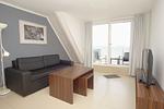 Wohnzimmer - FeWo26: Balkon, Meerblick, Strand - Top-Hundeurlaub