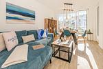 Wohnzimmer - Ferienwohnung Haff & Herz mit Fitness, Sauna, Freizeit- und Kinderspielbereich - Top-Hundeurlaub