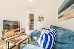 Wohnzimmer - Ferienwohnung Haff & Herz mit Fitness, Sauna, Freizeit- und Kinderspielbereich - Top-Hundeurlaub