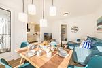 Wohnzimmer - Ferienwohnung Haff & Herz mit Fitness, Sauna, Freizeit- und Kinderspielbereich - Top-Hundeurlaub